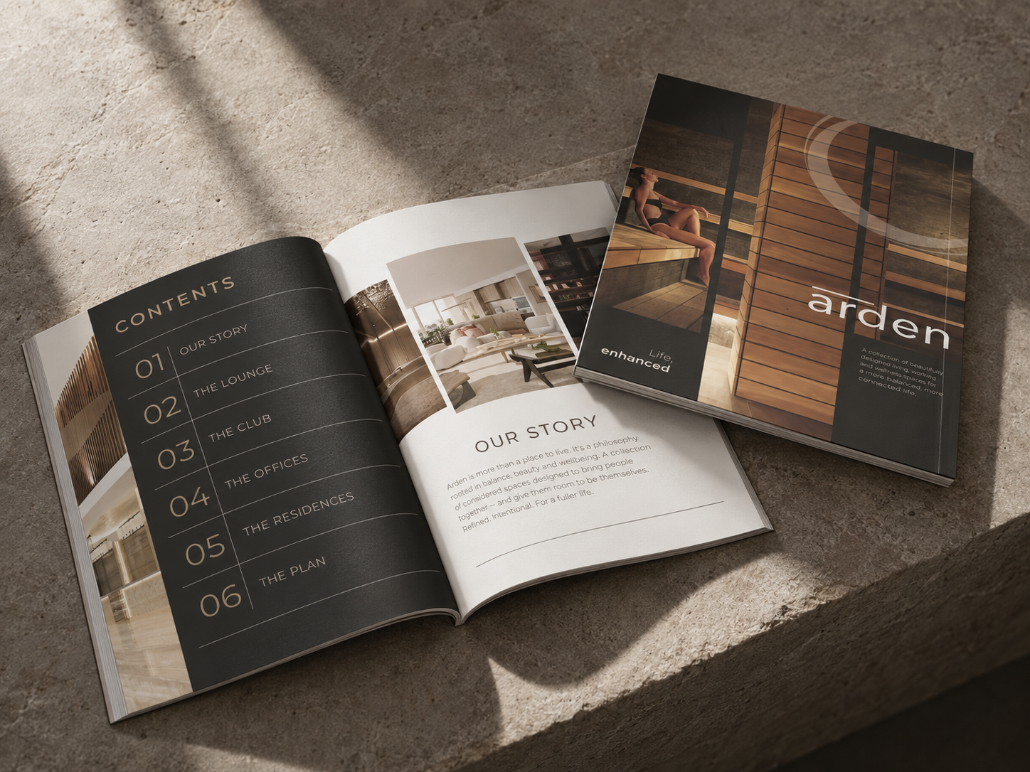 Arden brochure cover and open contents spread on stone
