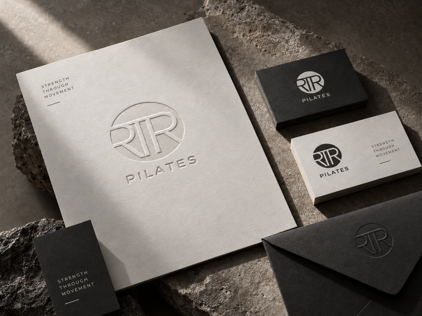 RTR Pilates identity on embossed letterhead, business cards and envelope